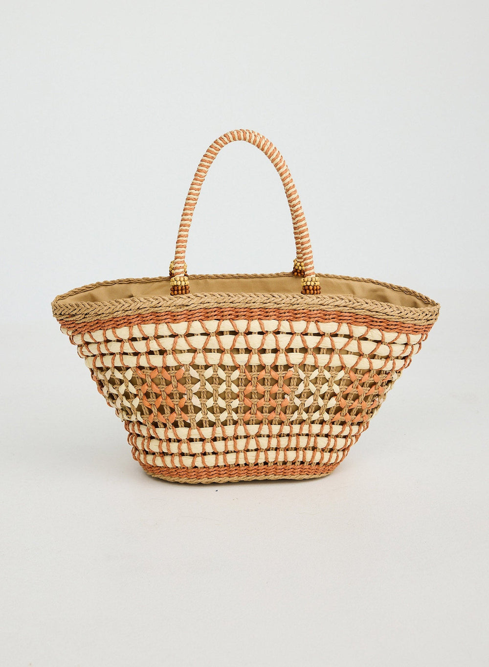 Woven basket with diamond pattern on a light gray background