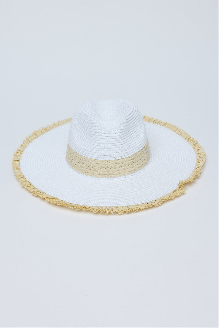 White sun hat with a natural band on a light gray background