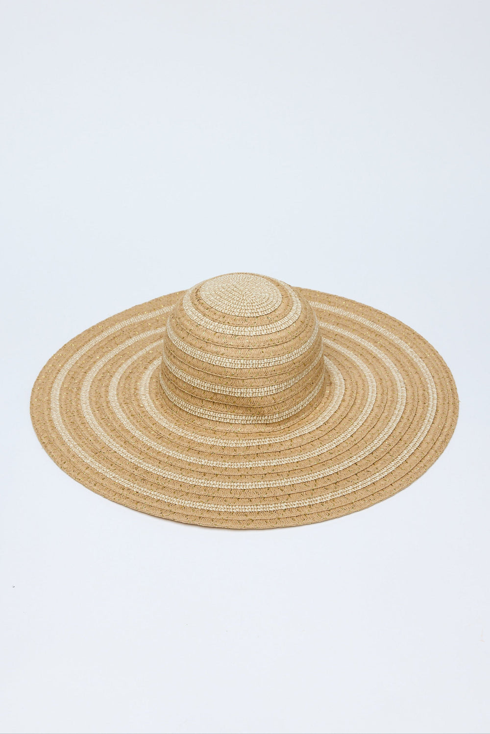 Beige straw hat on a light blue background