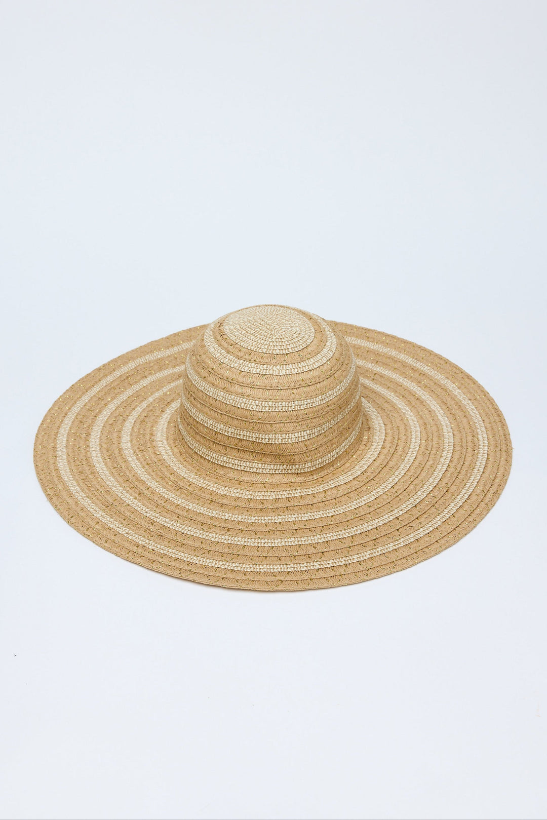 Beige straw hat on a light blue background