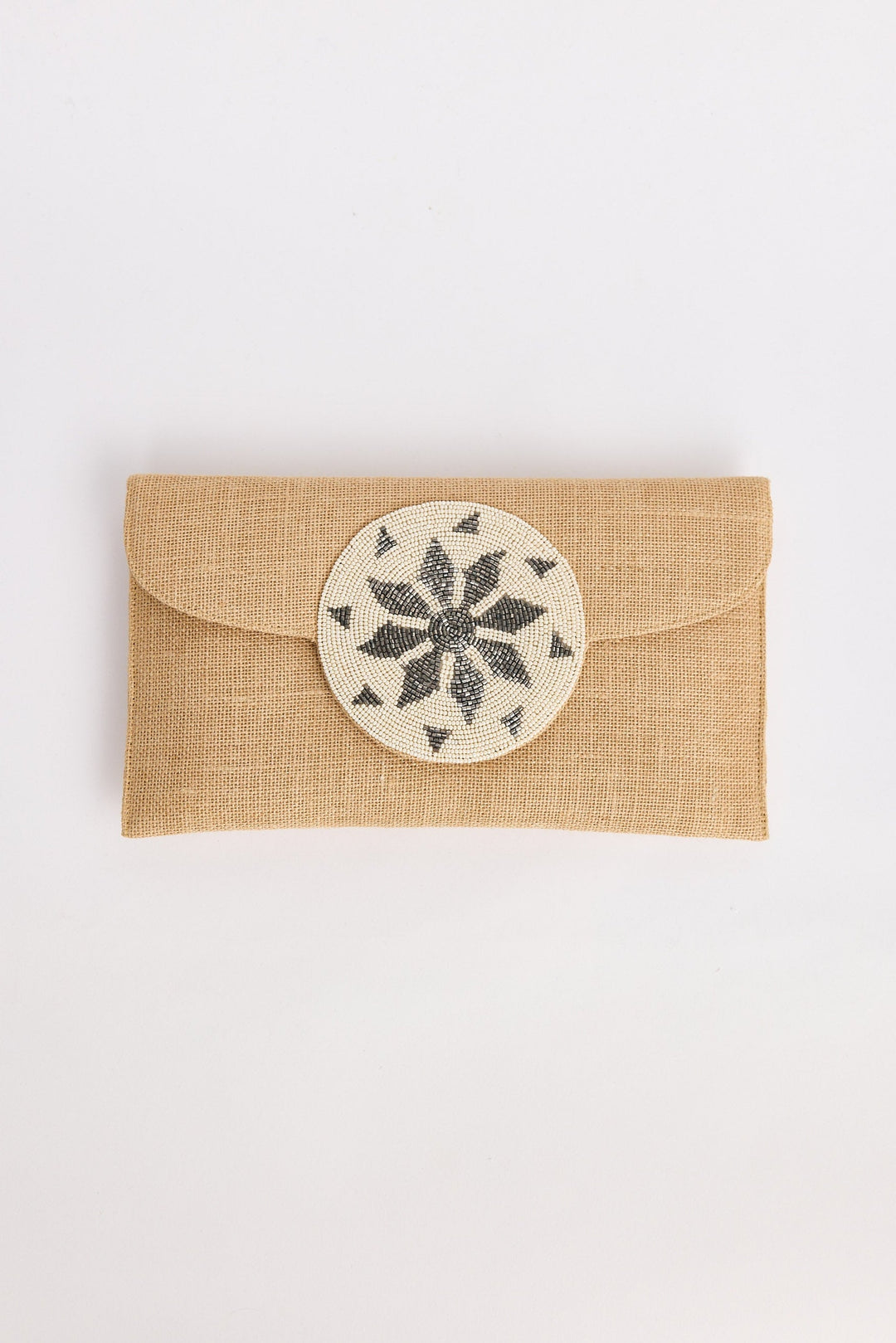 Beige fabric pouch with a round decorative patch on a white background