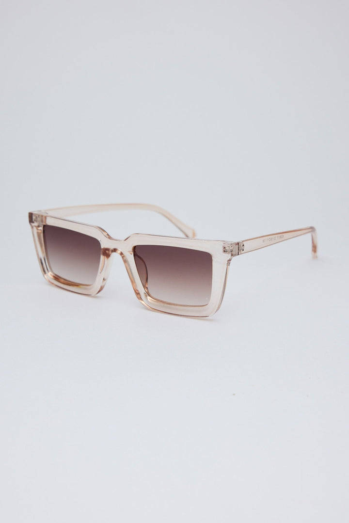 Angled view of Clear Coastline Sunglasses on white background