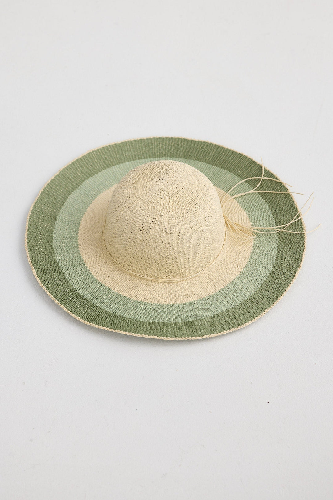 Straw hat with green stripes