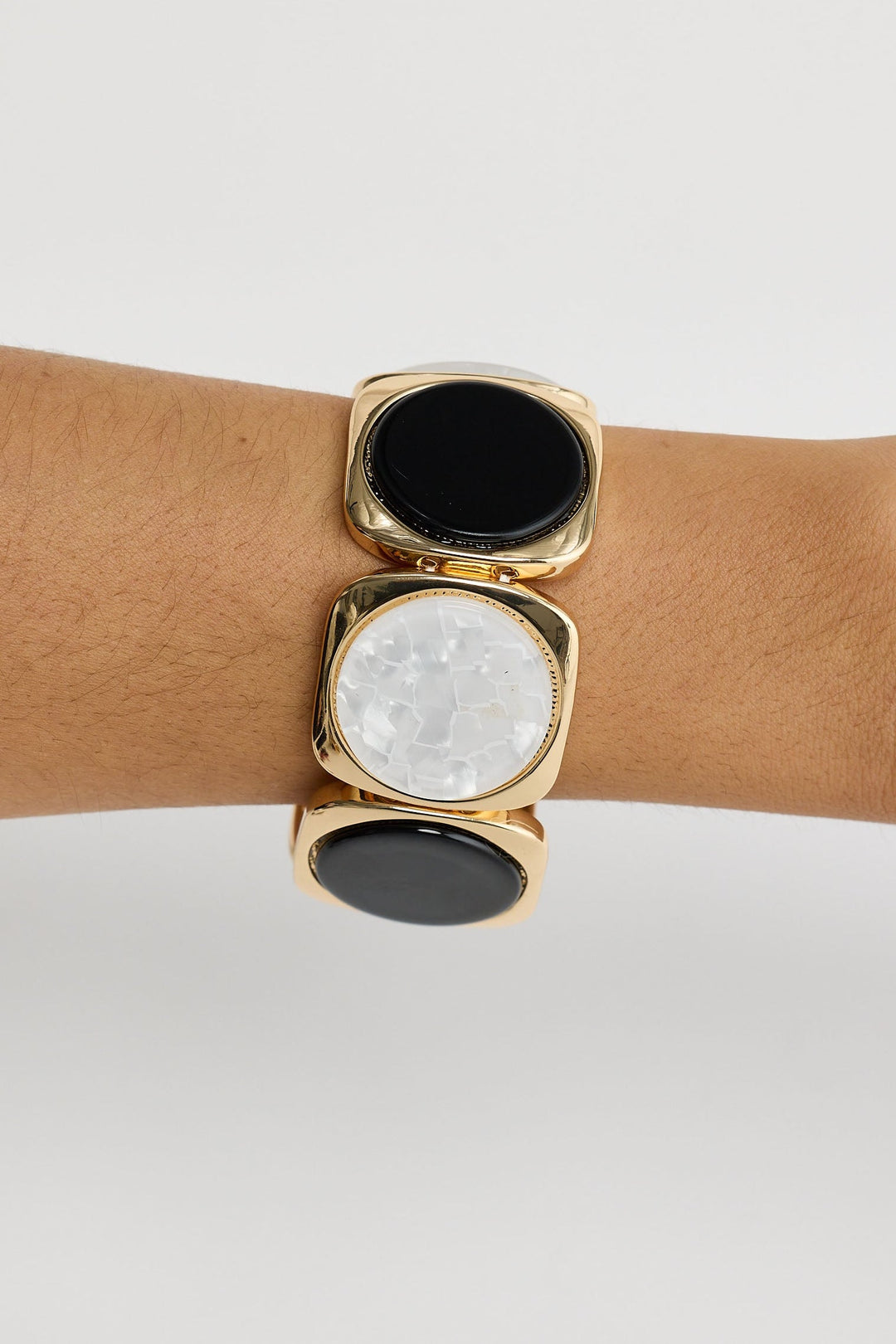 Close-up of black w white rover stretch bracelet bracelet on white background.