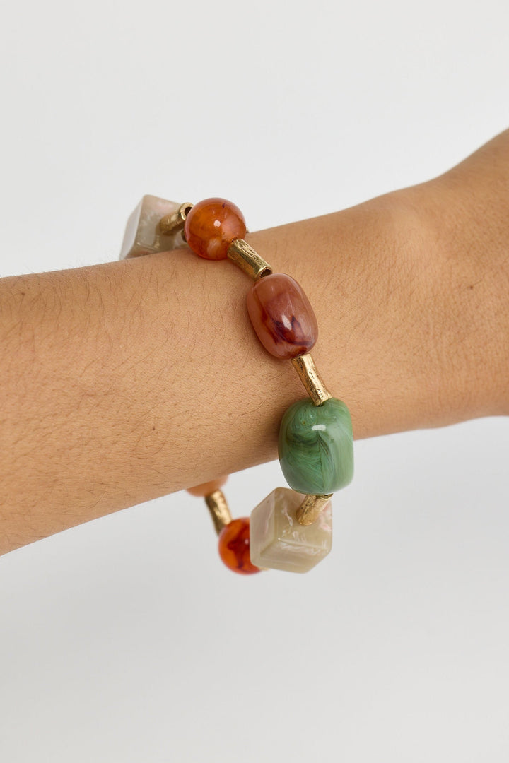 Close-up of sage autumn bracelet bracelet on white background.