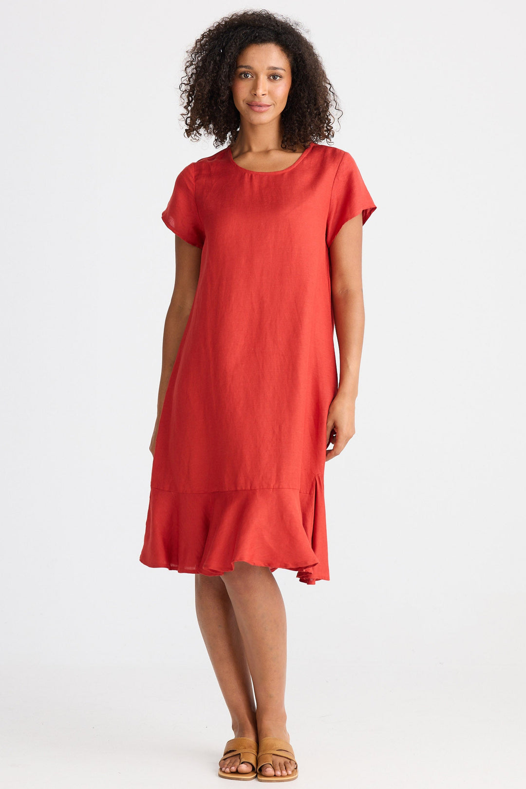 Woman wearing a red dress on a white background