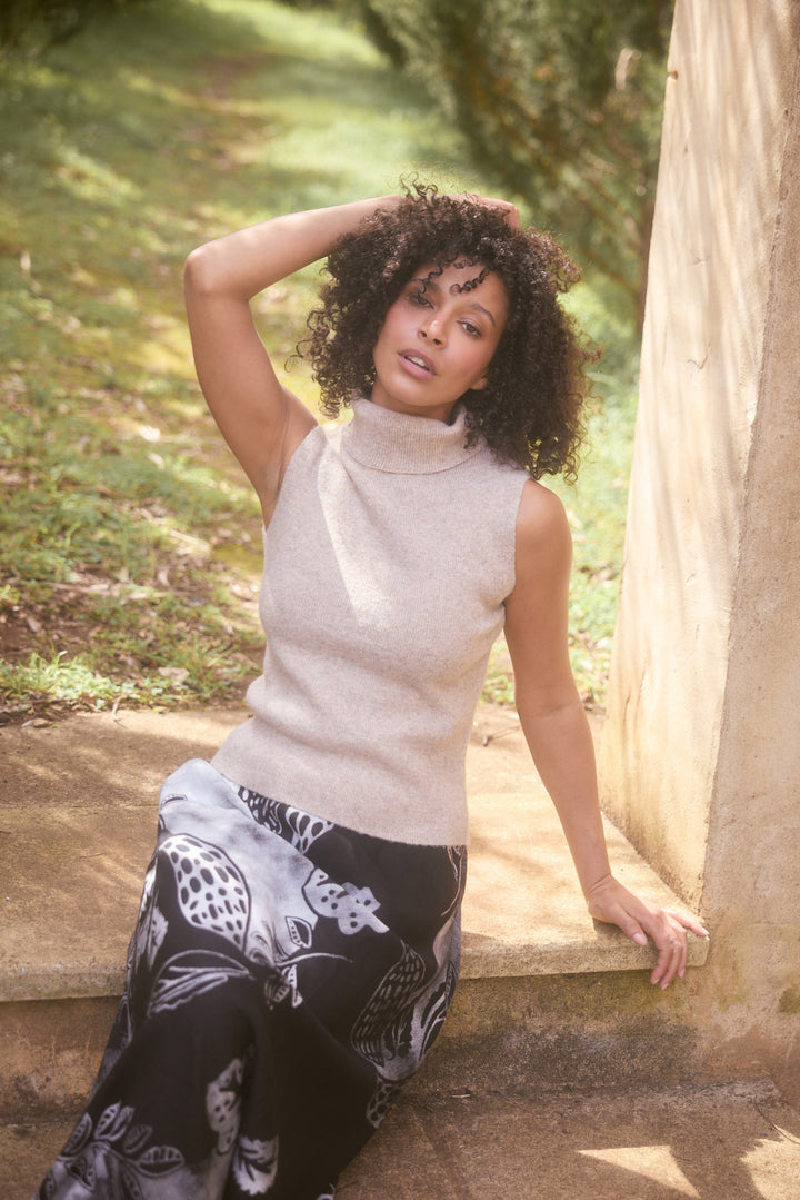 Model wearing oatmeal Lucerne Knit Top, lifestyle close-up view