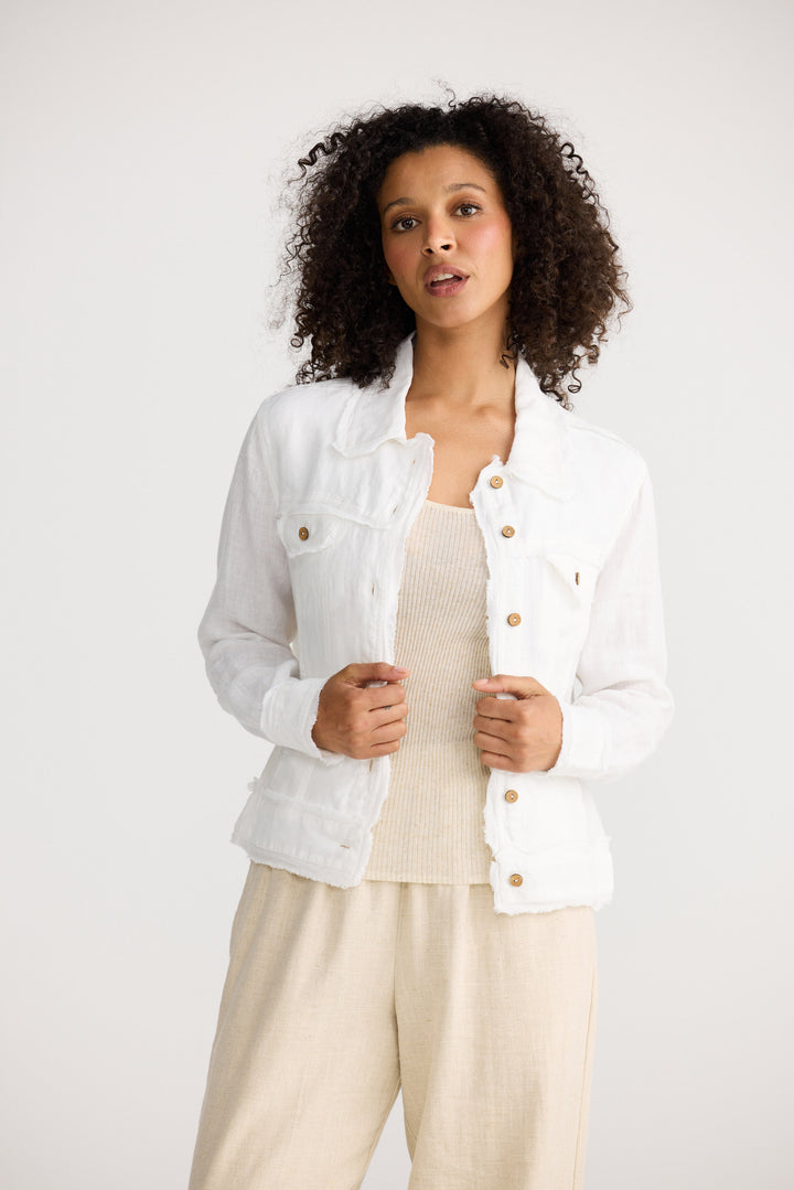 Monza Jacket in White Linen with a button-through front closure.