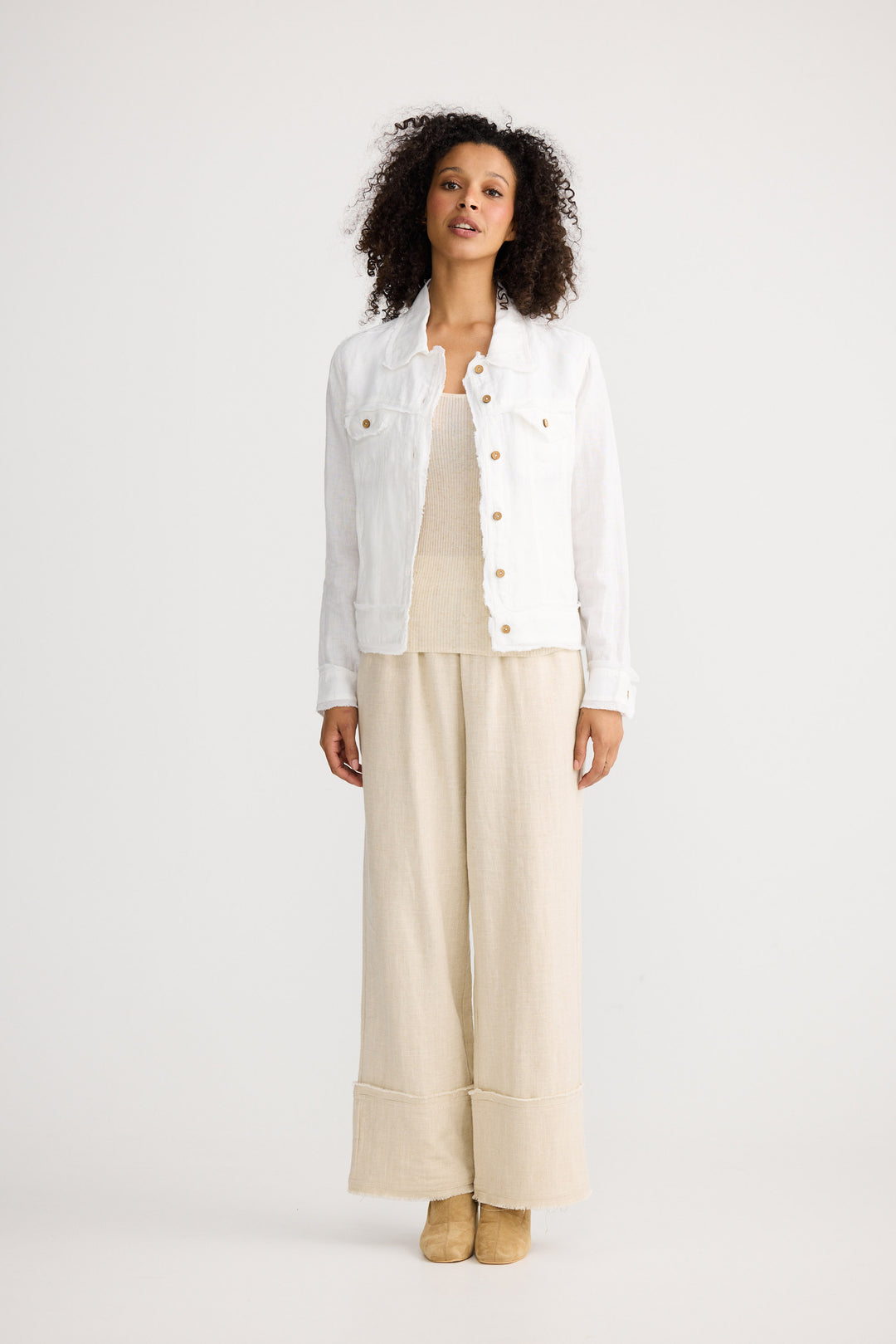 Monza Jacket in White Linen with a collared neckline.