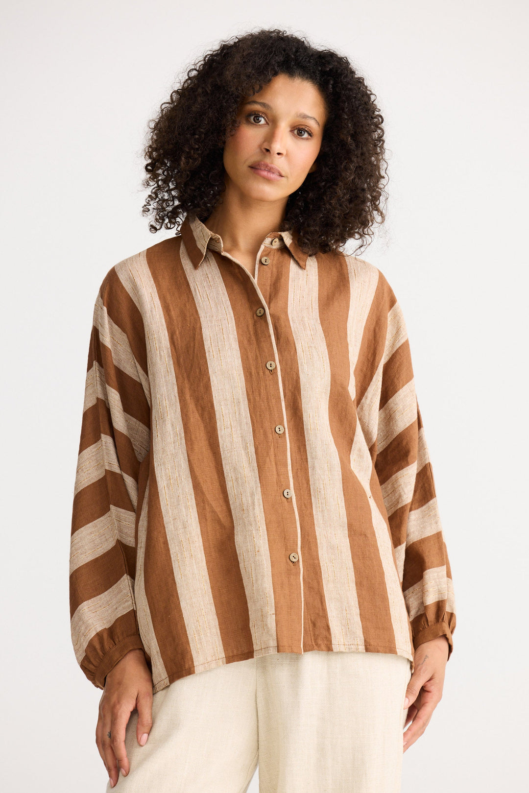 Model wearing sienna stripe Milano Shirt, front view on white background