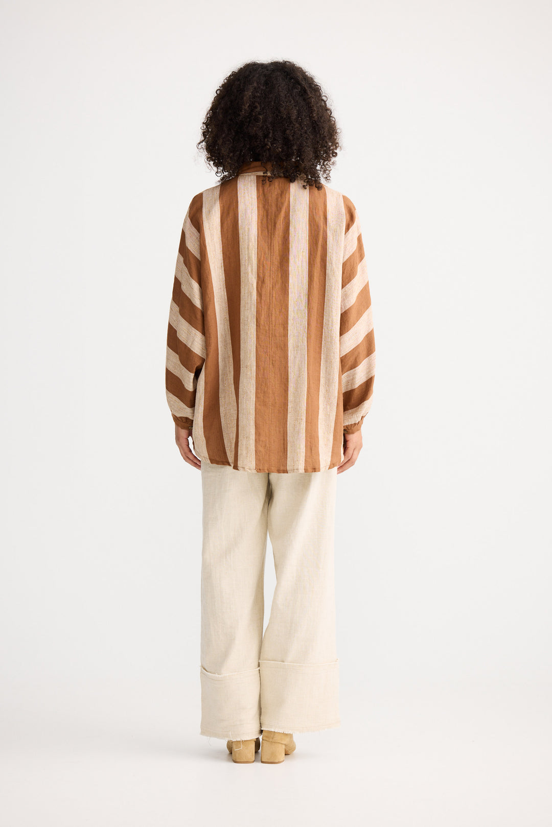 Model wearing sienna stripe Milano Shirt, back view on white background