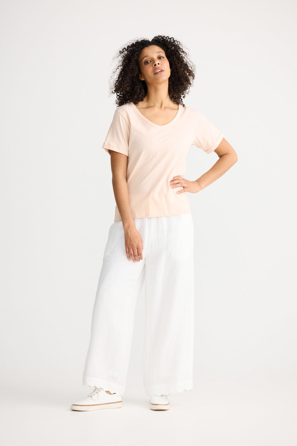 Model wearing peony Kasai Short Sleeve Tee, angled front view on white background