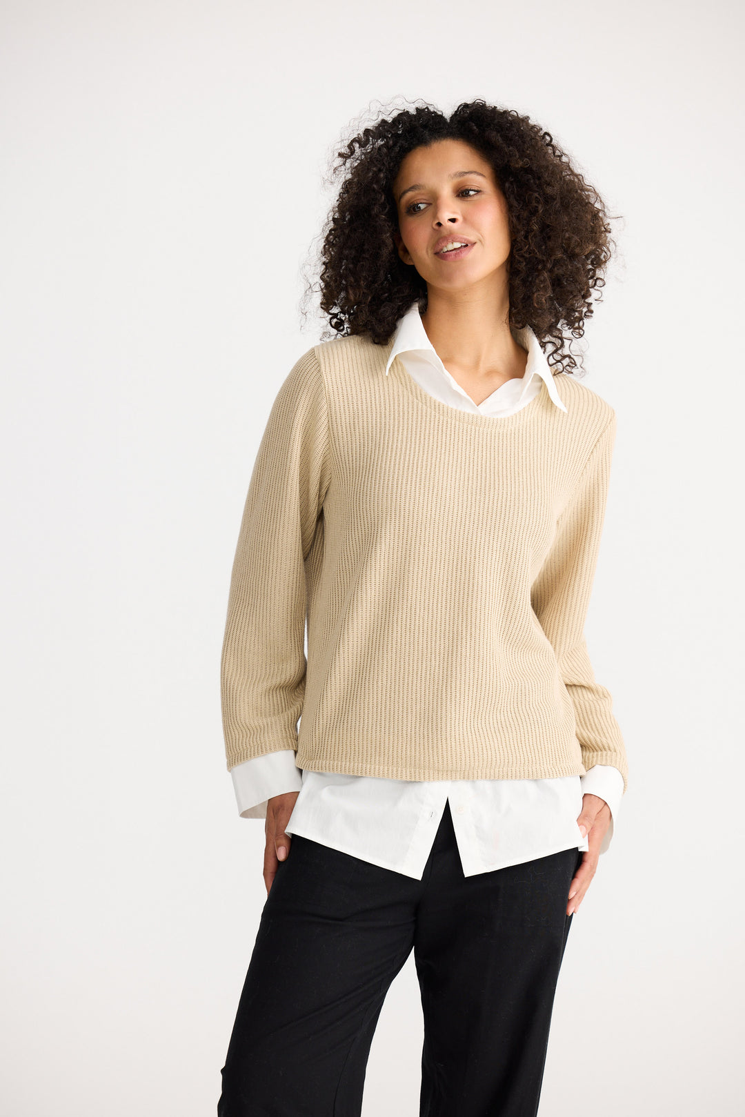 Model wearing natural w white Sorrento Top, back view on white background