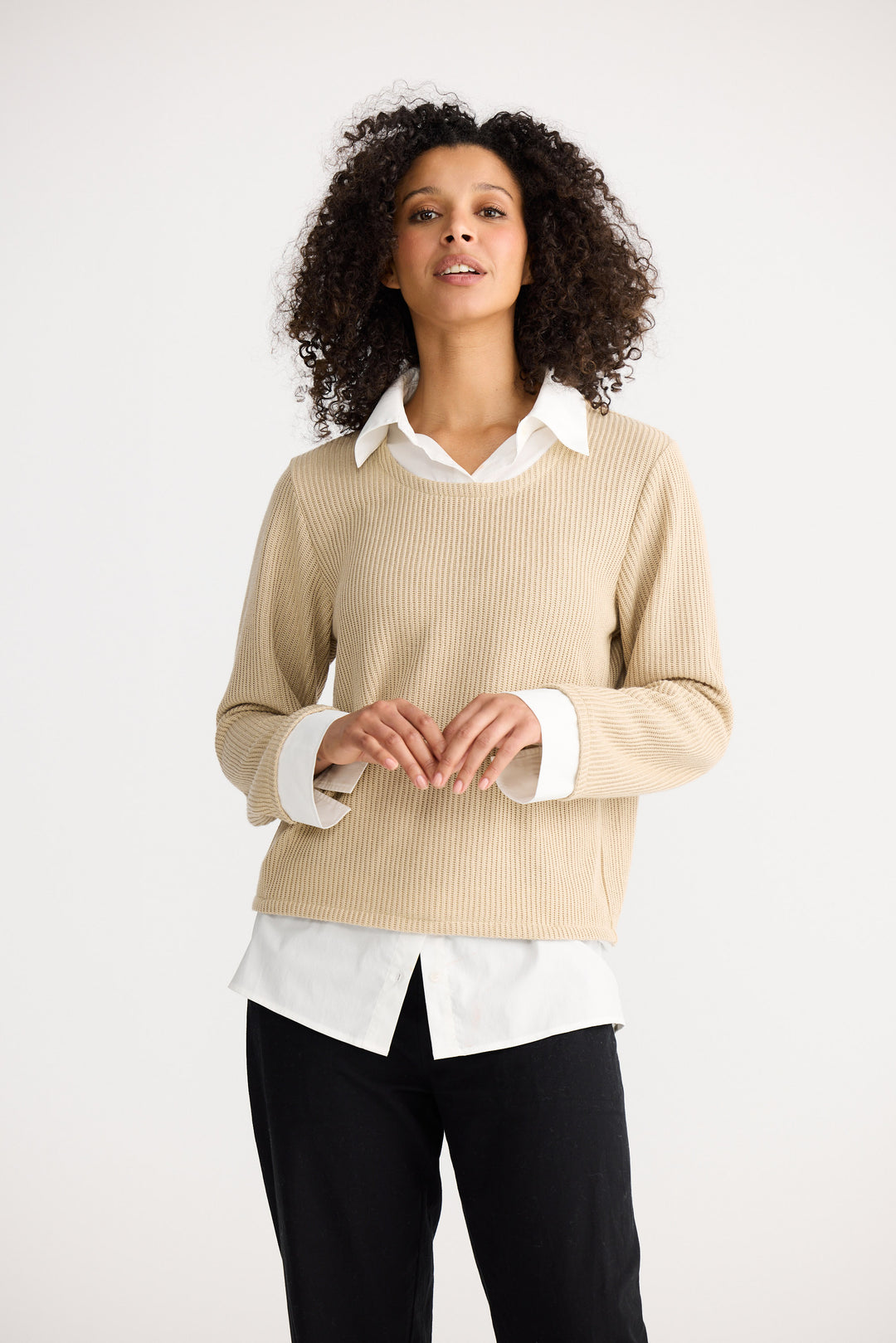 Model wearing natural w white Sorrento Top, side view on white background