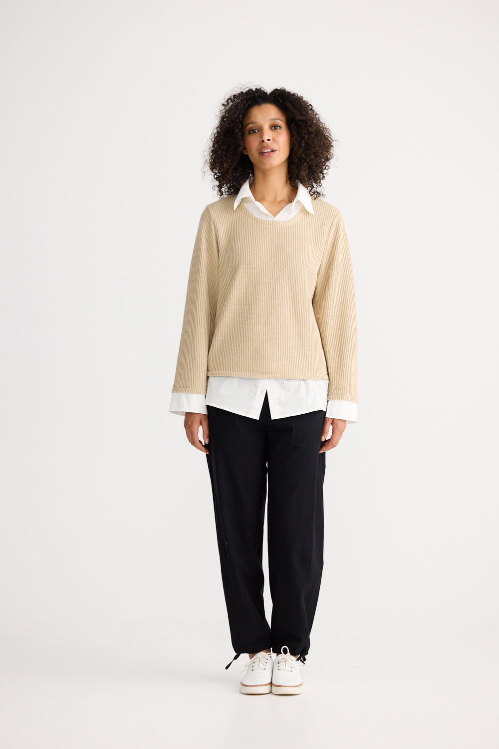 Model wearing natural w white Sorrento Top, angled front view on white background