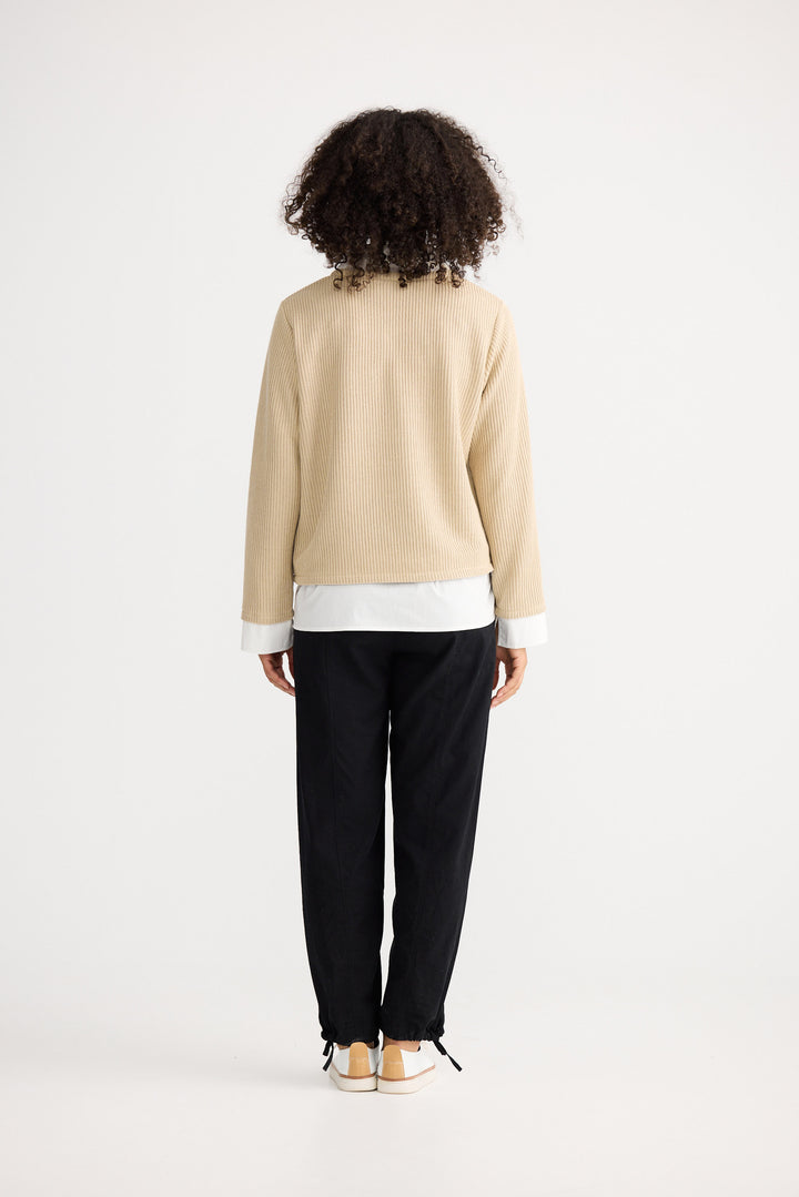 Model wearing natural w white Sorrento Top, front view on white background