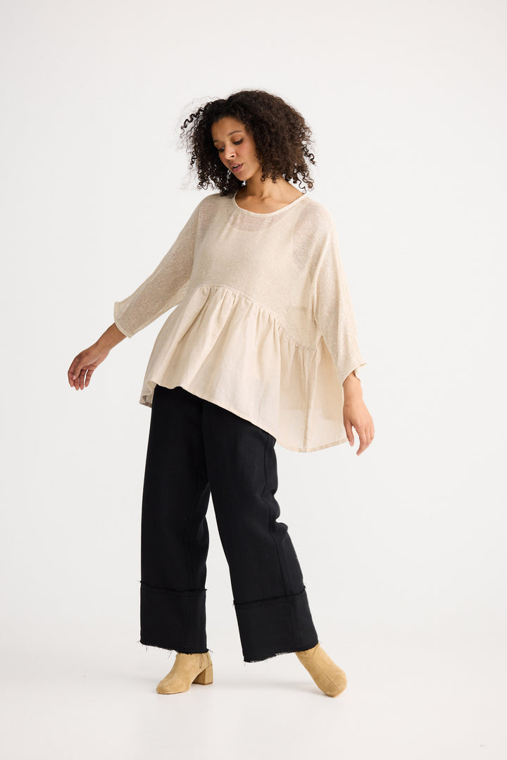 Model wearing natural Nikita Top, angled front view on white background