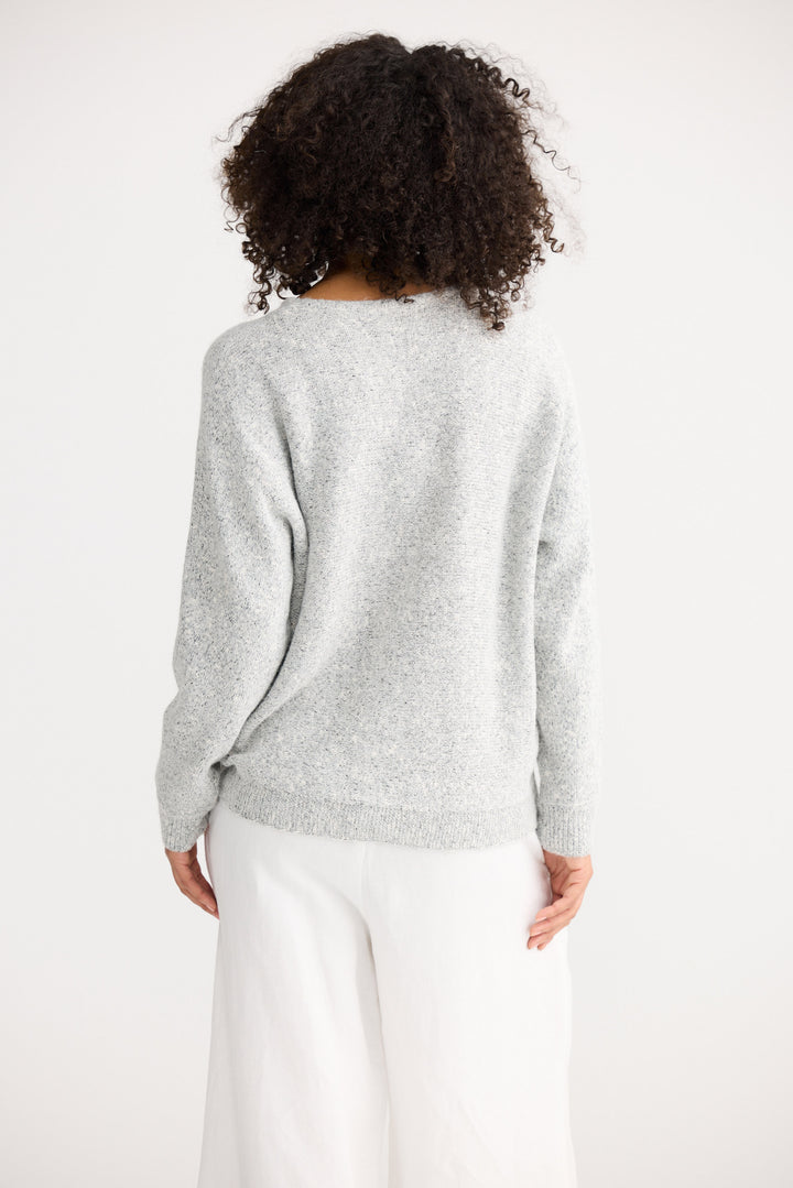 Model wearing grey marle Freddie Knit, front view on white background