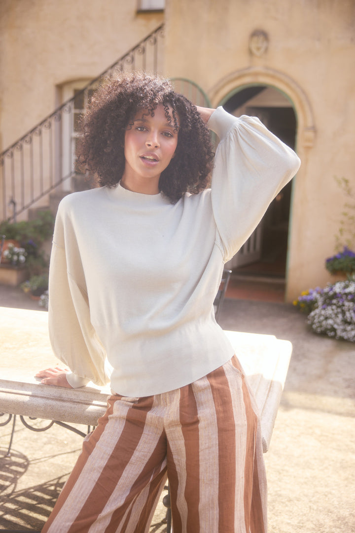 Model wearing oatmeal Anais Knit Top, lifestyle view