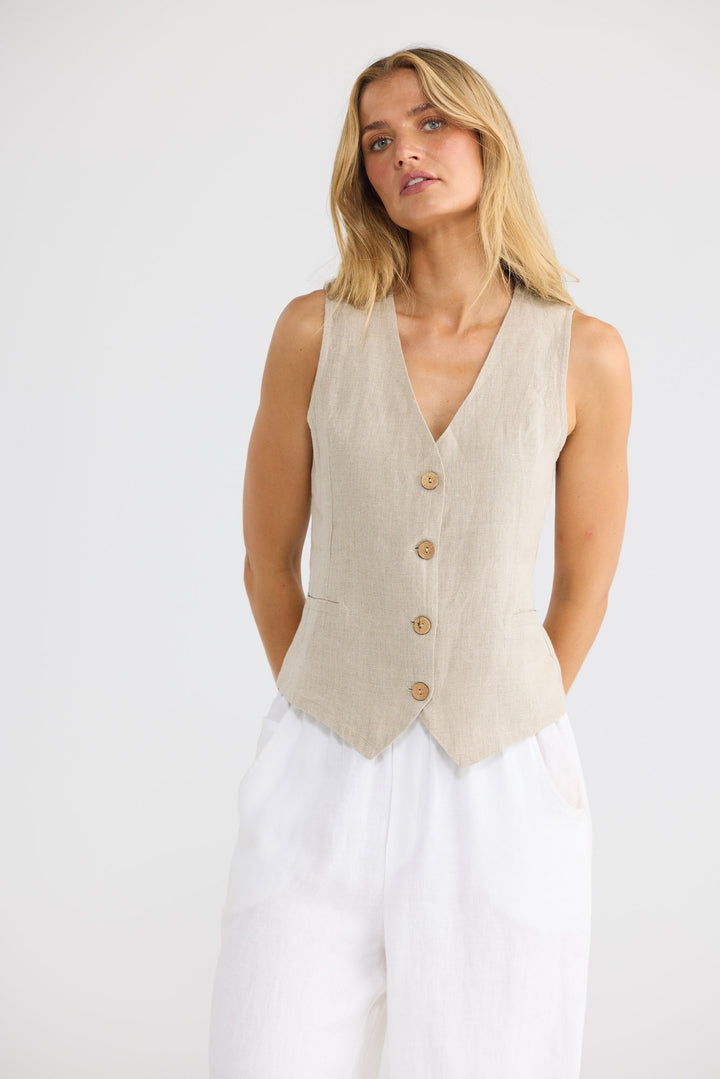 Model wearing Britta Vest in natural linen, front view.