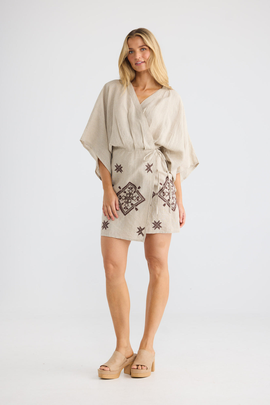 Jeanne Wrap Dress in Natural Linen with a wrap-front design.