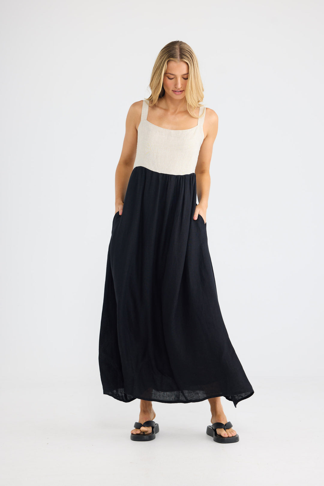Britta Dress in Black with Natural with wide adjustable straps.