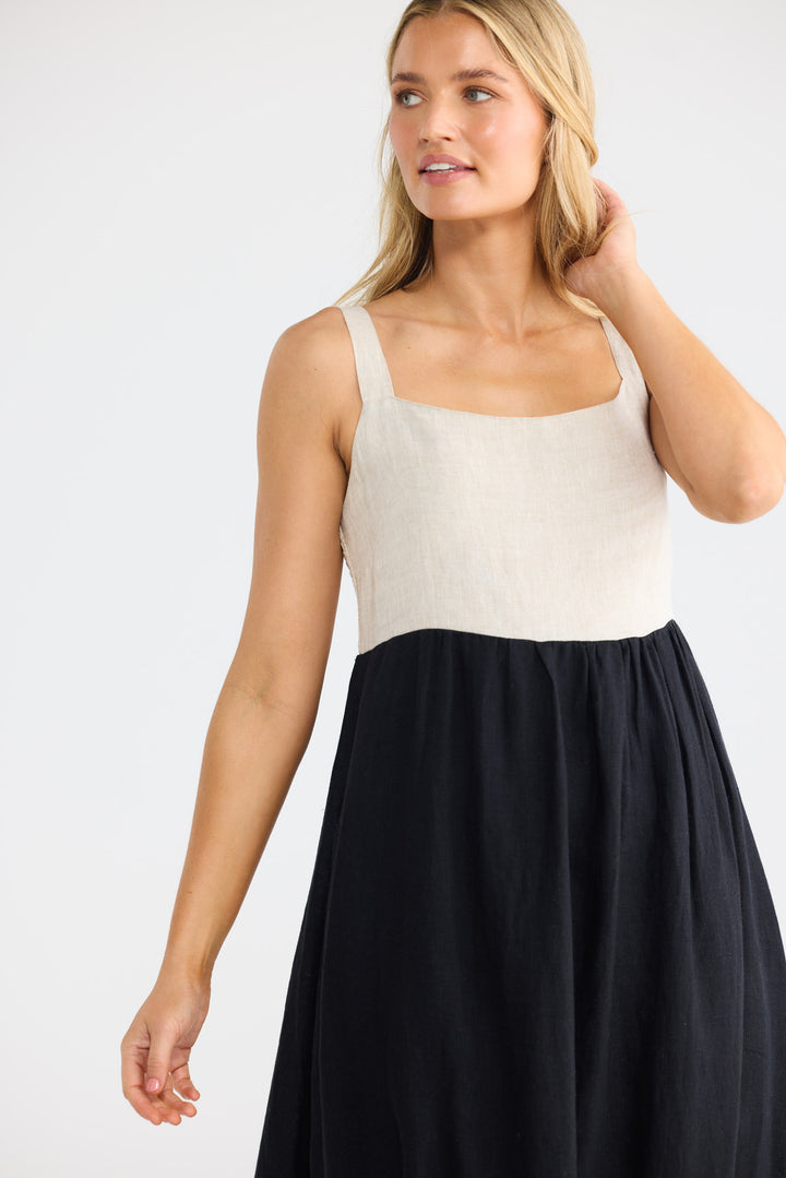 Britta Dress in Black with Natural with a square neckline.