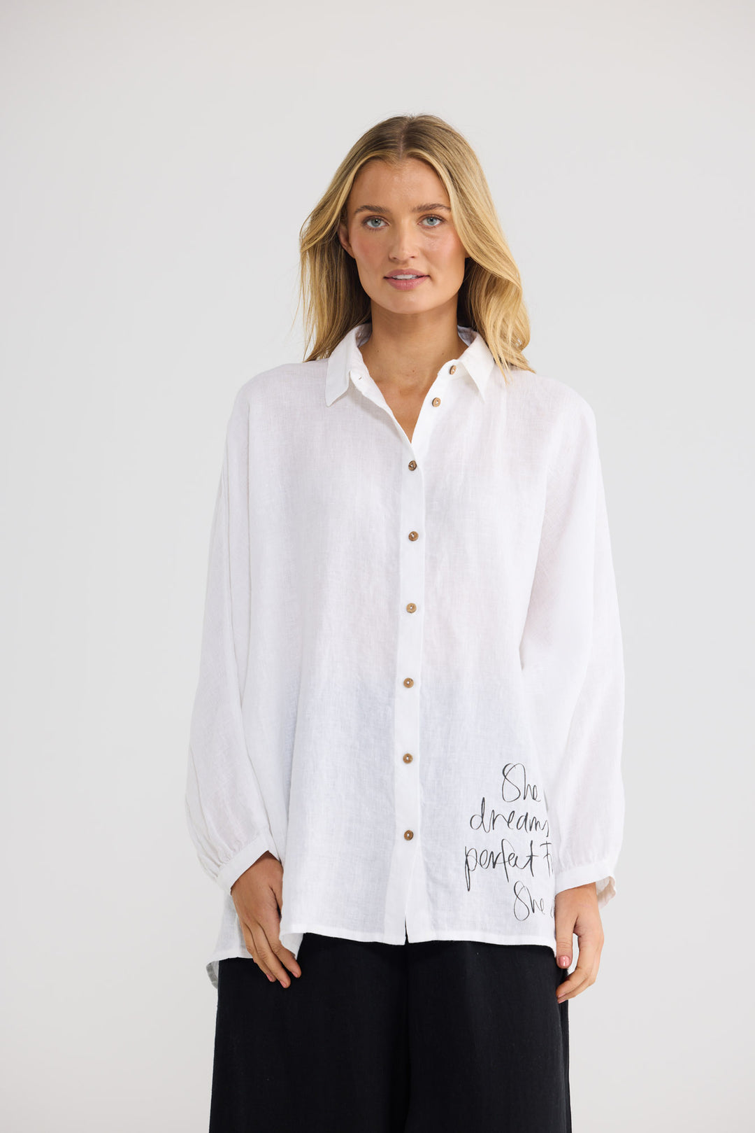 Milano Shirt in White Linen with a button-through front closure.