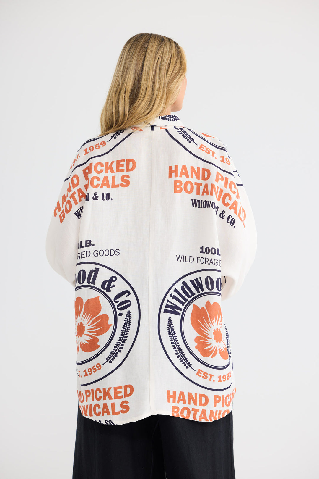 Milano Shirt in Hand Picked Botanicals with a collared neckline.