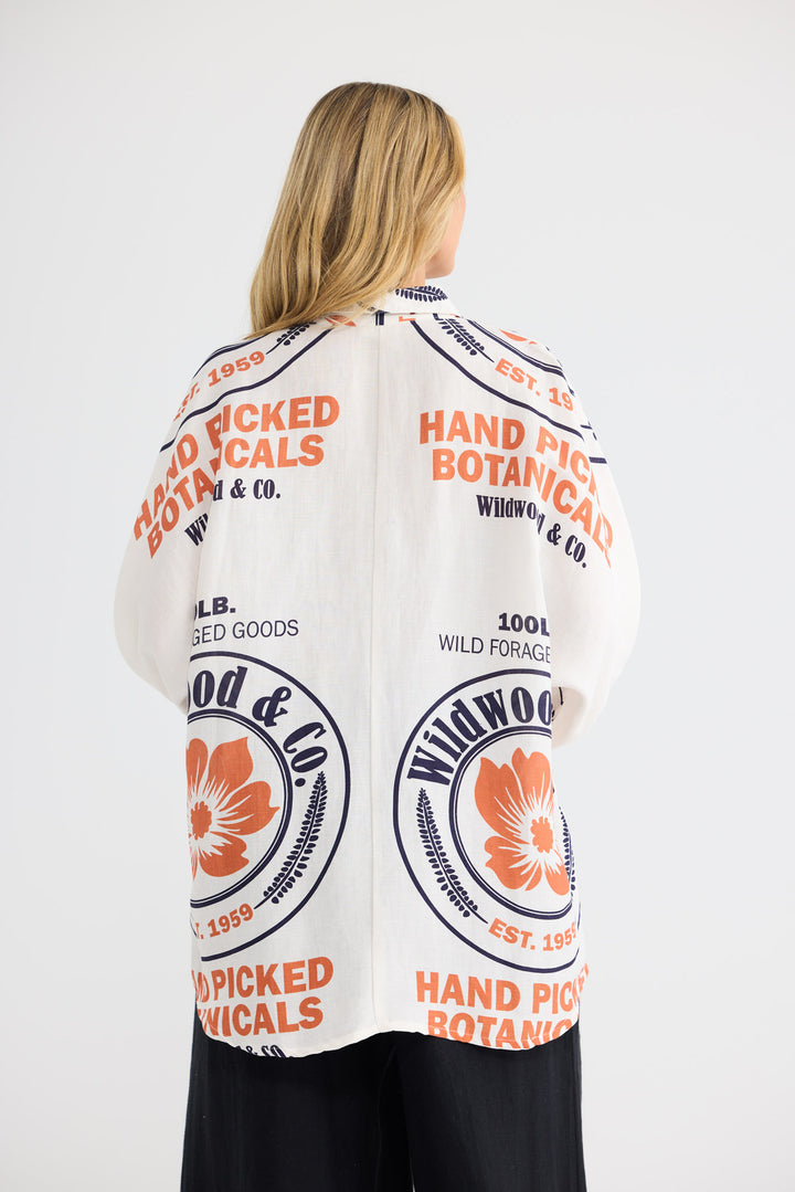 Milano Shirt in Hand Picked Botanicals with a collared neckline.