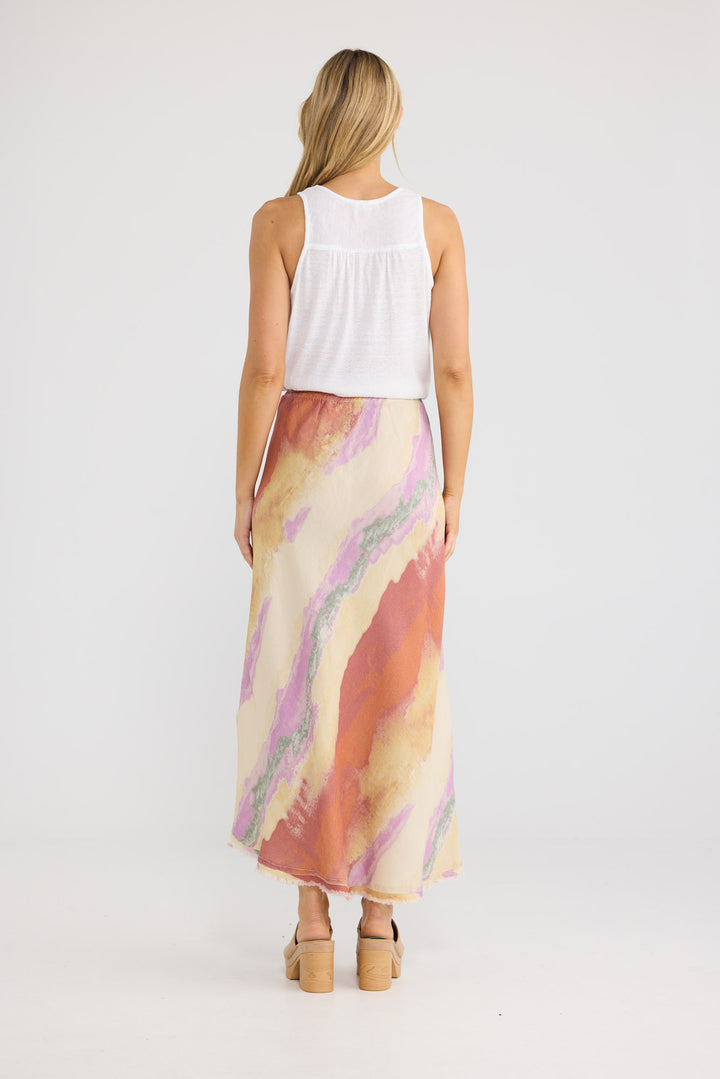 Model wearing Sicily Skirt in Sand Dunes print, front view.
