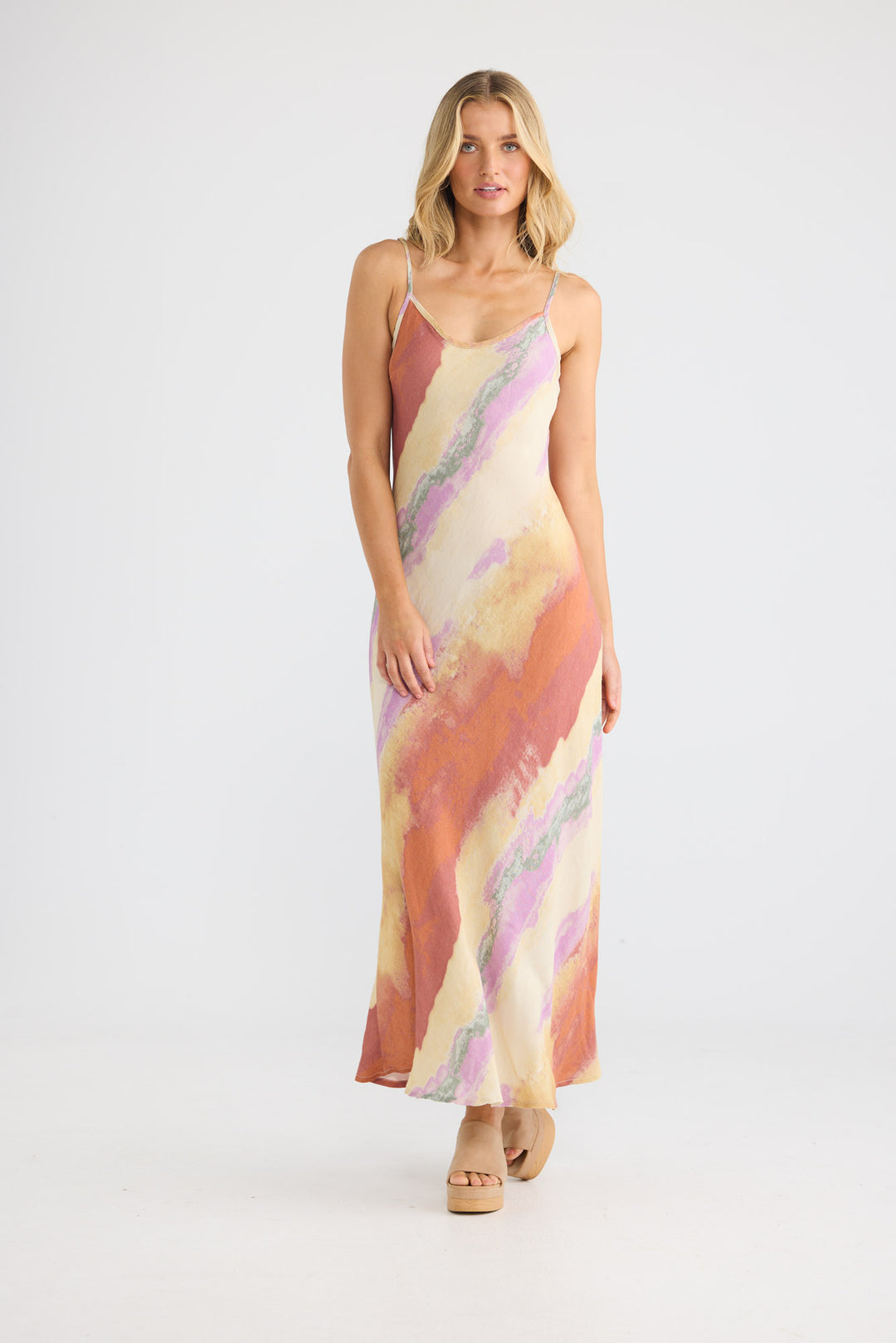 Model wearing Coco Bias Dress in Sand Dunes print, front view.