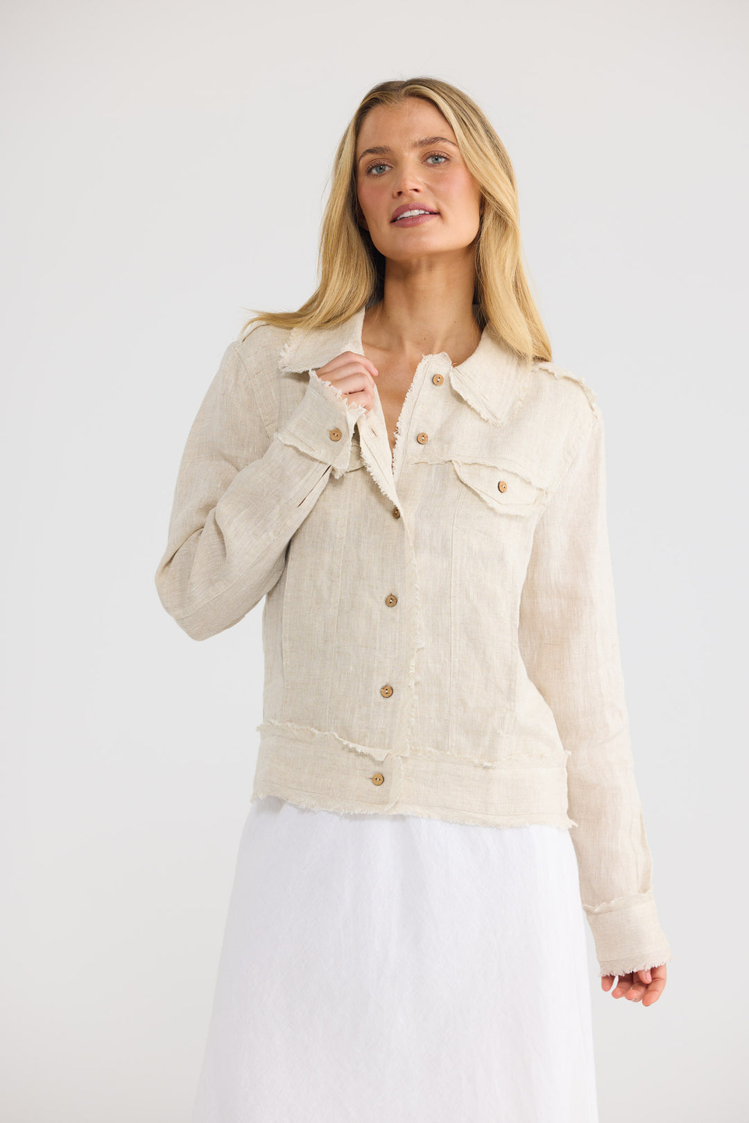 Monza Jacket in Natural Linen with a button-through front closure.