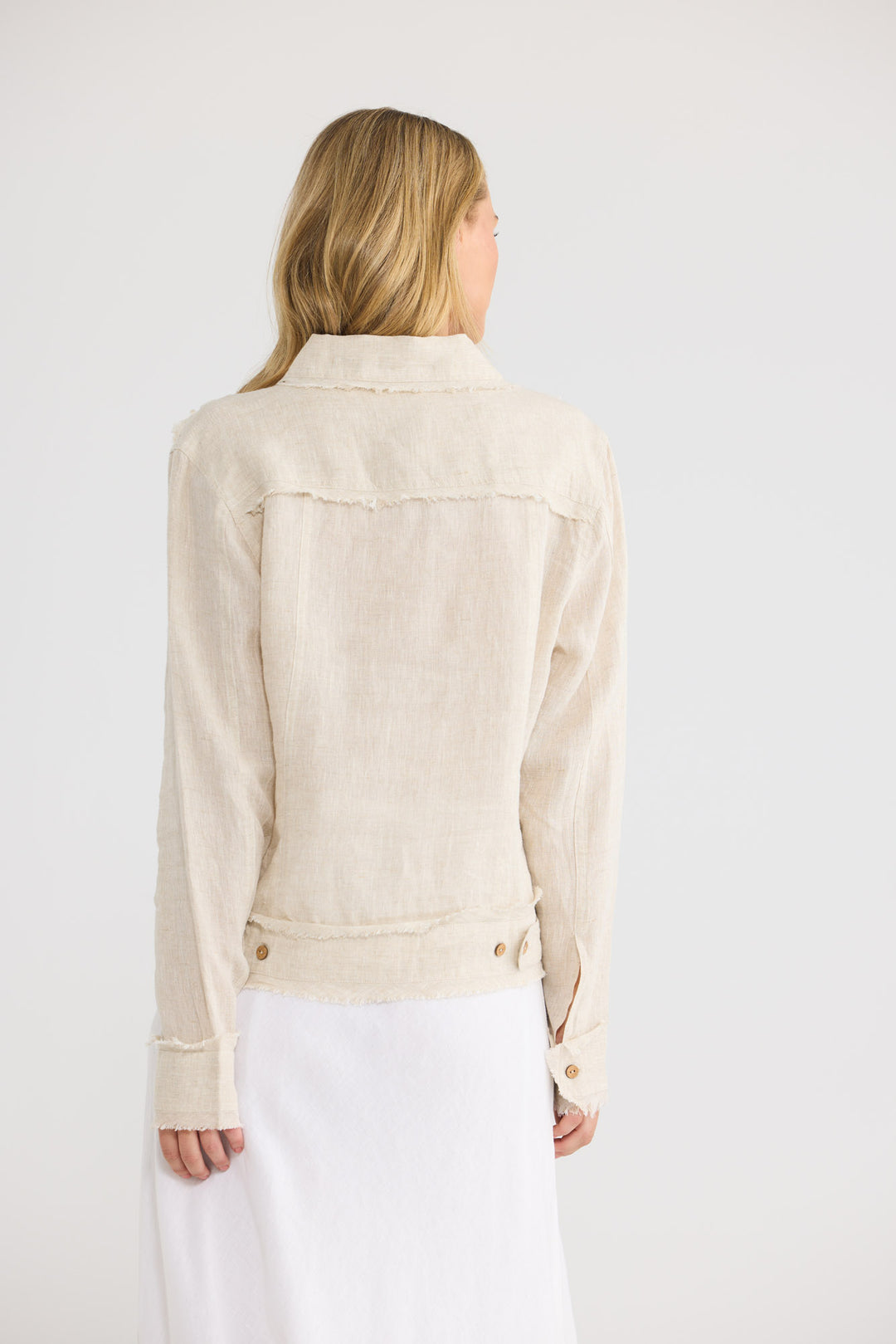 Monza Jacket in Natural Linen with a collared neckline.