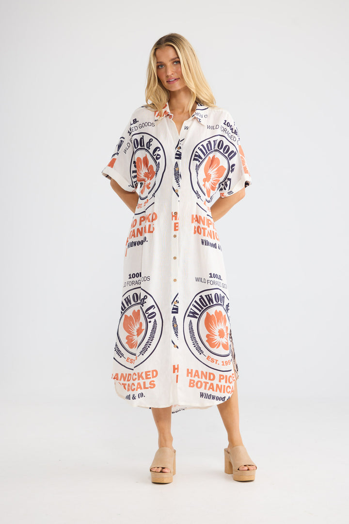 Felicita Dress in Hand Picked Botanicals with a collared neckline.