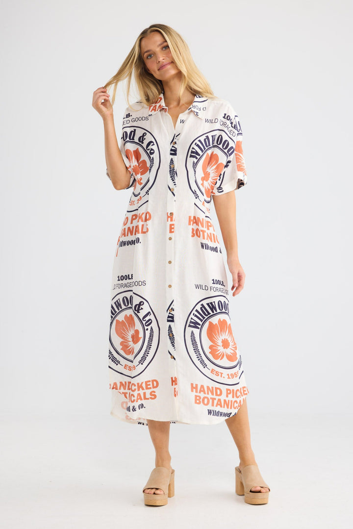Model wearing Felicita Dress in Hand Picked Botanicals print, front view.