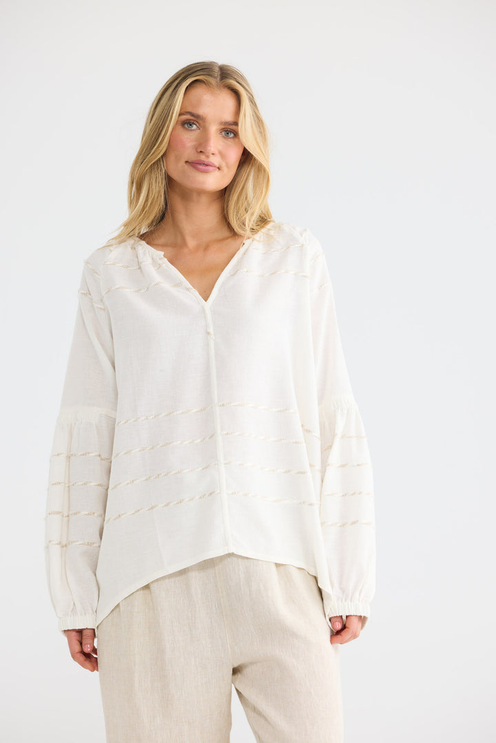 Salerno Top in Cloud Stripe with a v-shaped neckline.