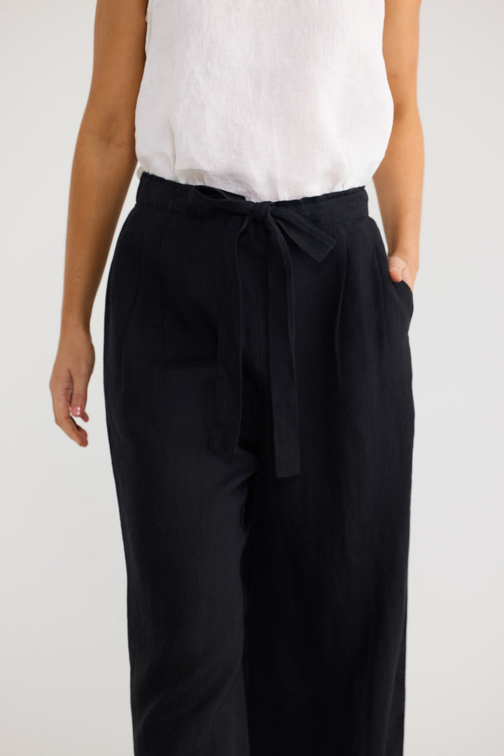 Dickens Pant in Black Linen with a waist tie at front.