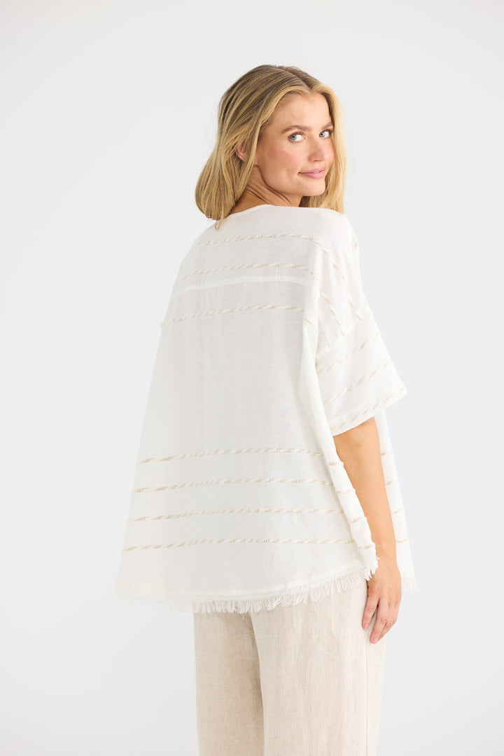 Model wearing Scout Top in Cloud Stripe, front view.