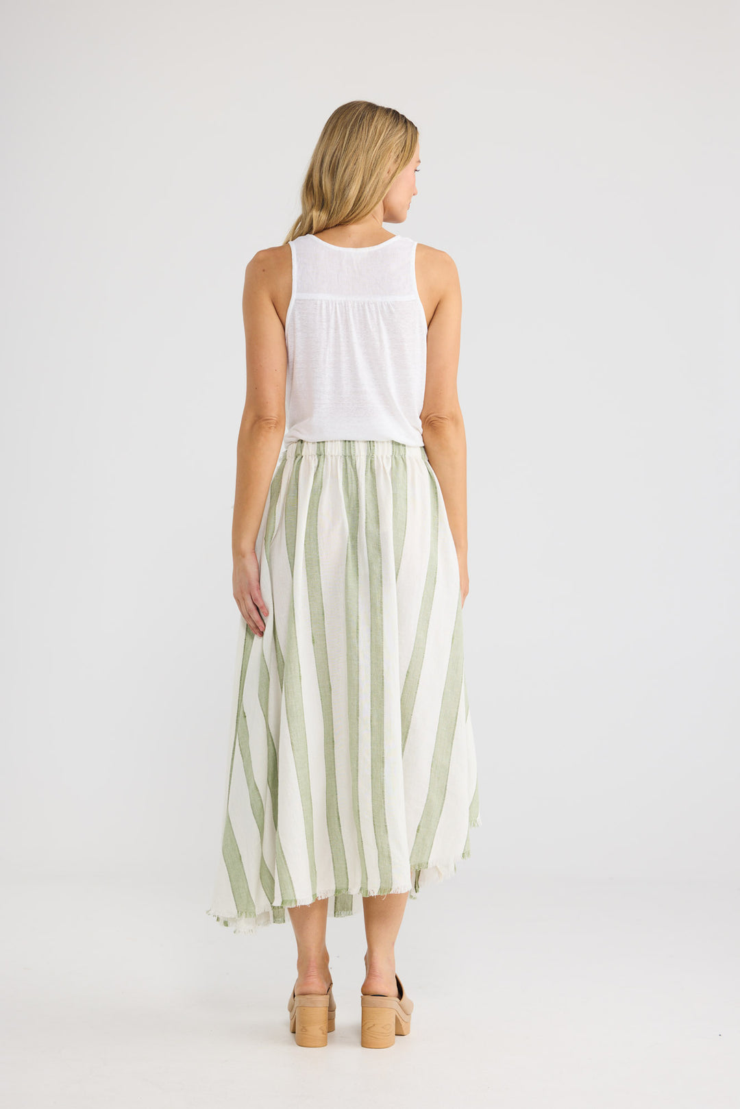 The Edit Skirt in Sage Shadow Stripe with an elasticated back waistband.