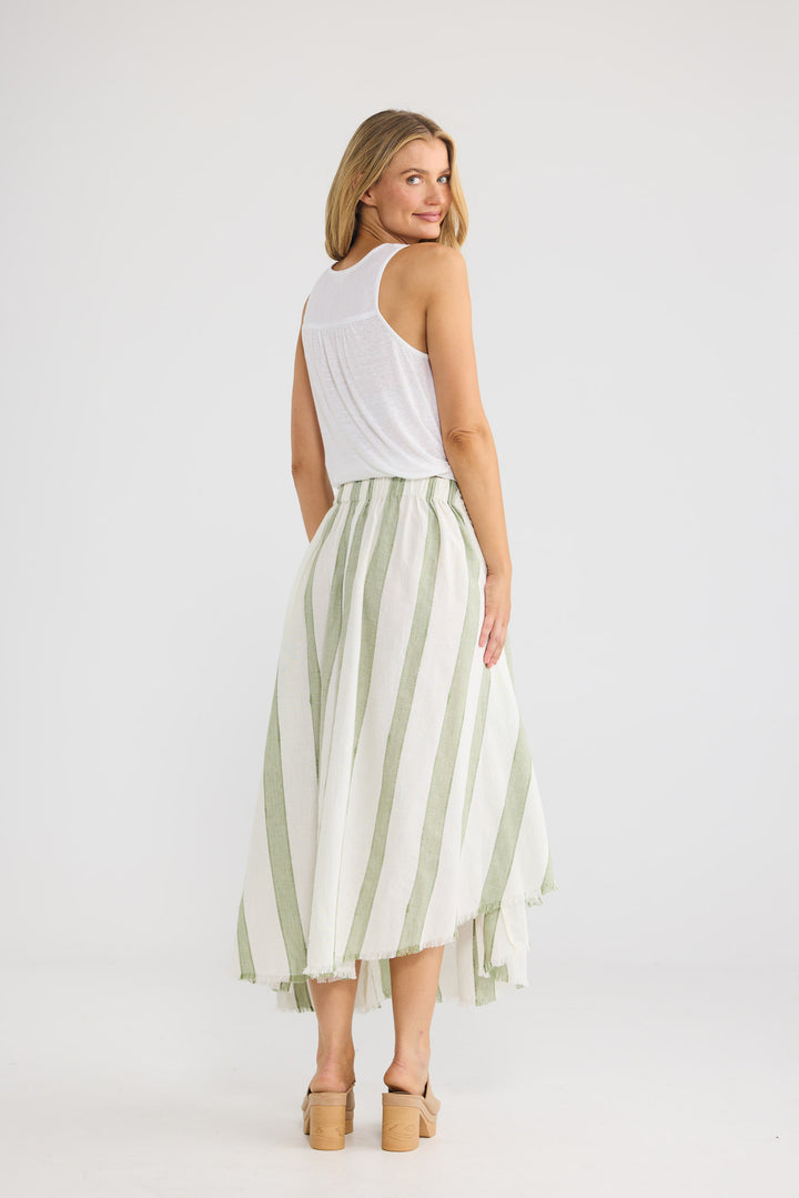 The Edit Skirt in Sage Shadow Stripe with a waist sash.