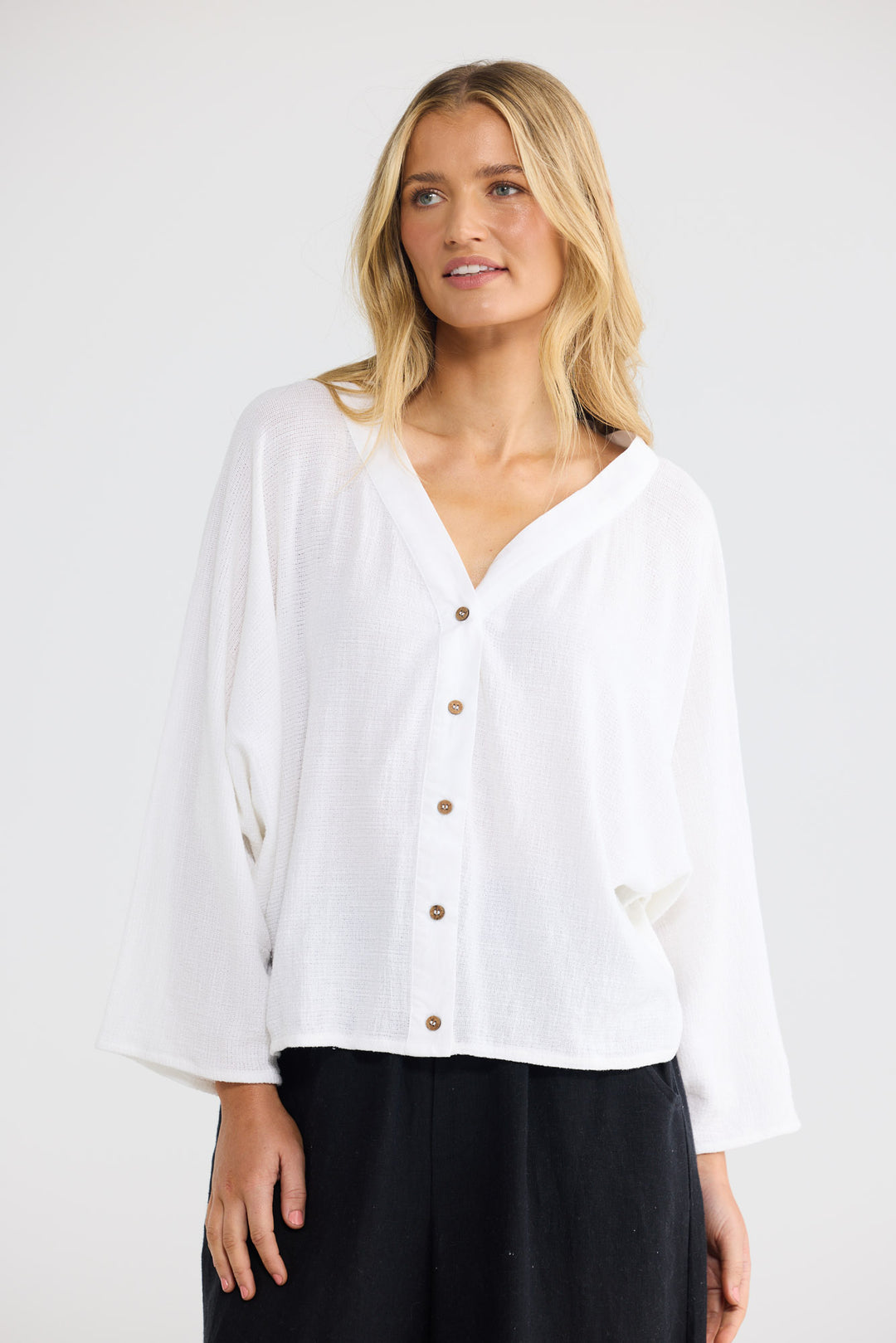 Giorgio Overshirt in White with a button-through front closure.