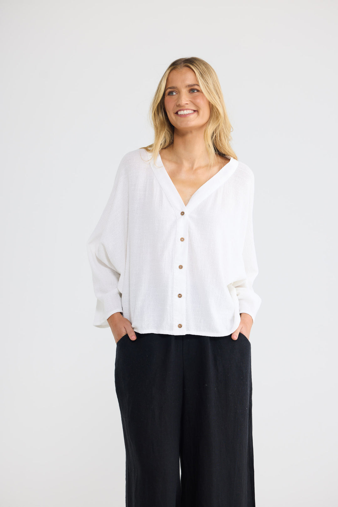 Giorgio Overshirt in White with a v-shaped neckline.