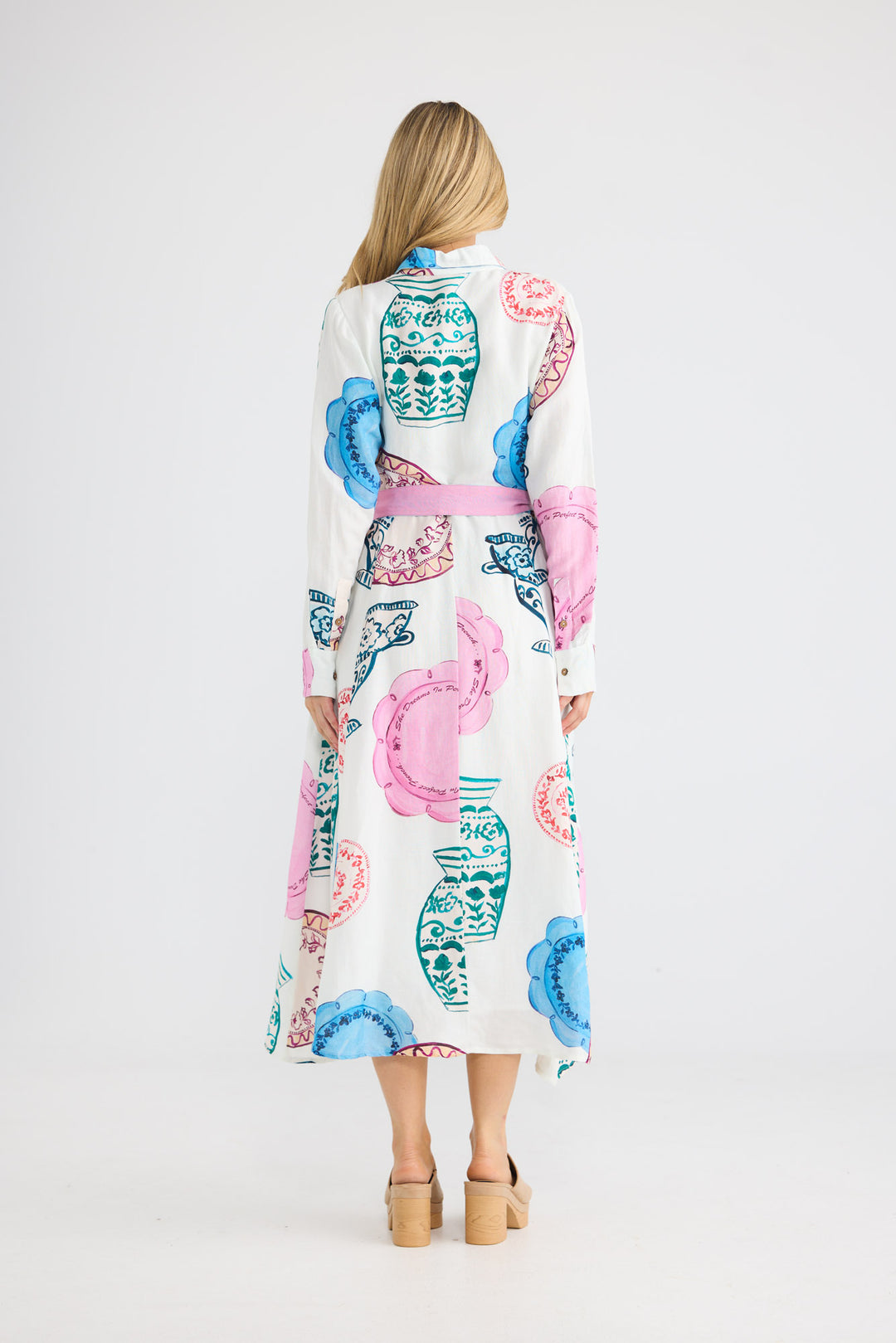 Sardinia Dress in Perfect French with a button-through front closure.