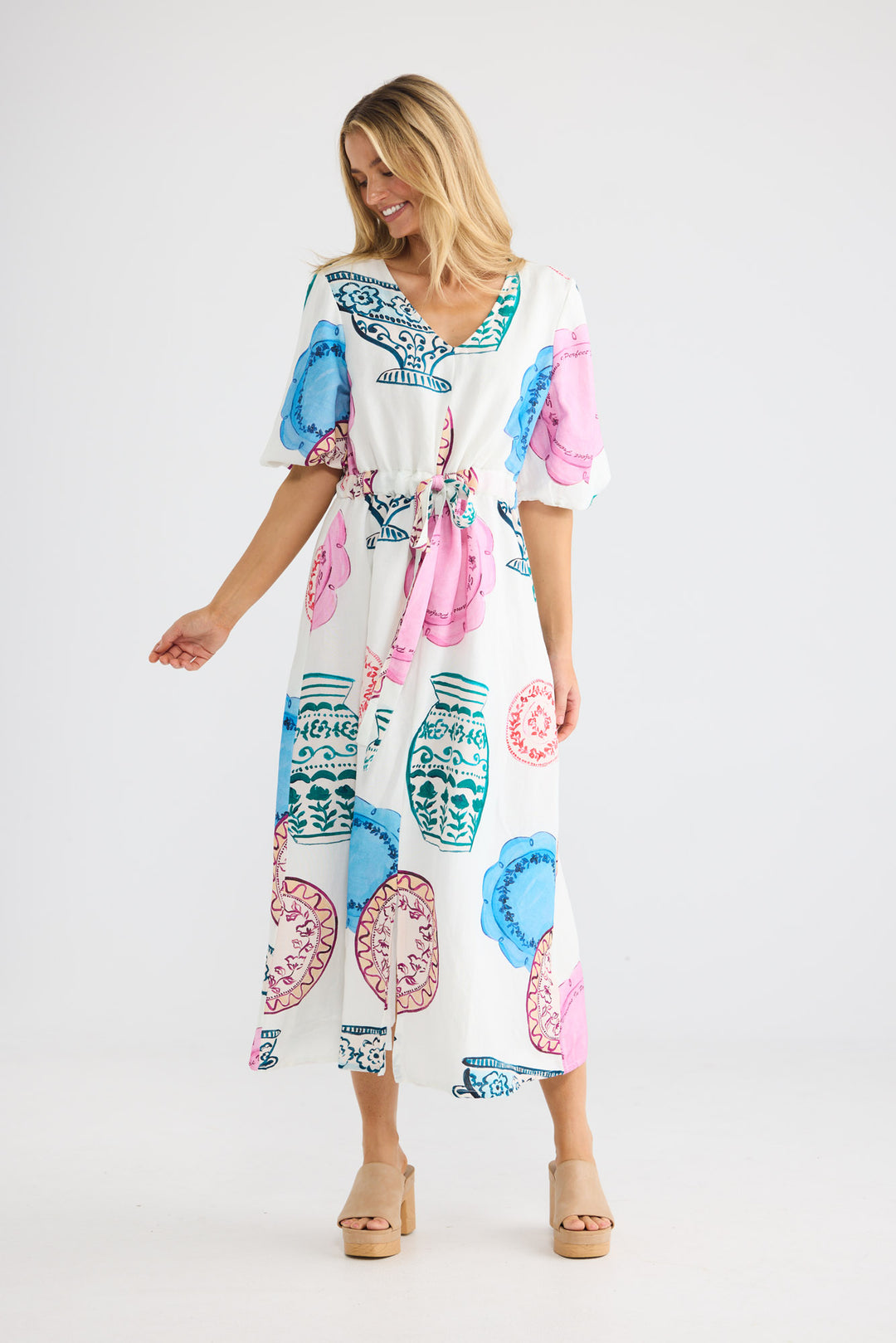 Model wearing Ava Dress in Perfect French print, front view.